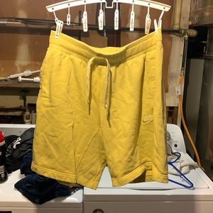 yellow nike drawstring sweat shorts